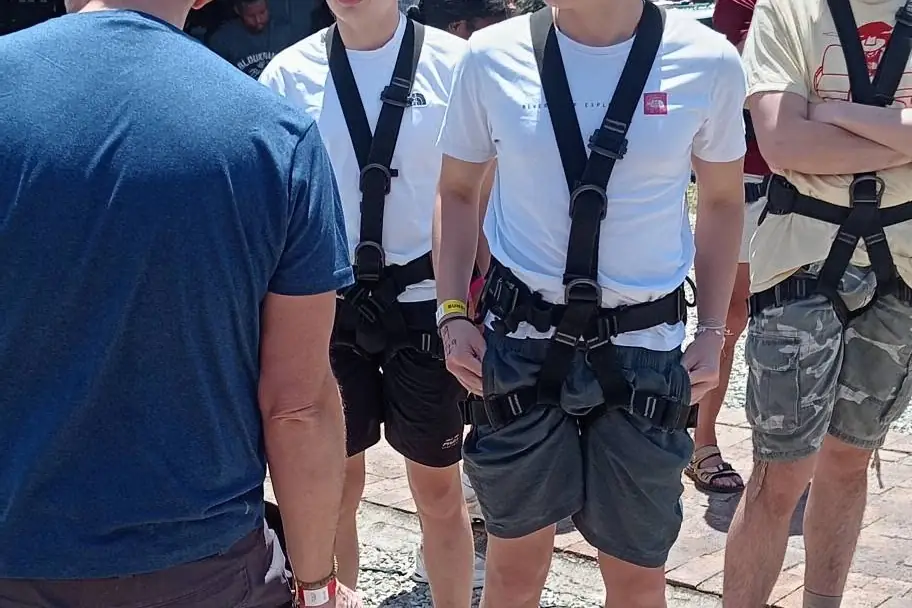 A group getting ready for the bungee jump