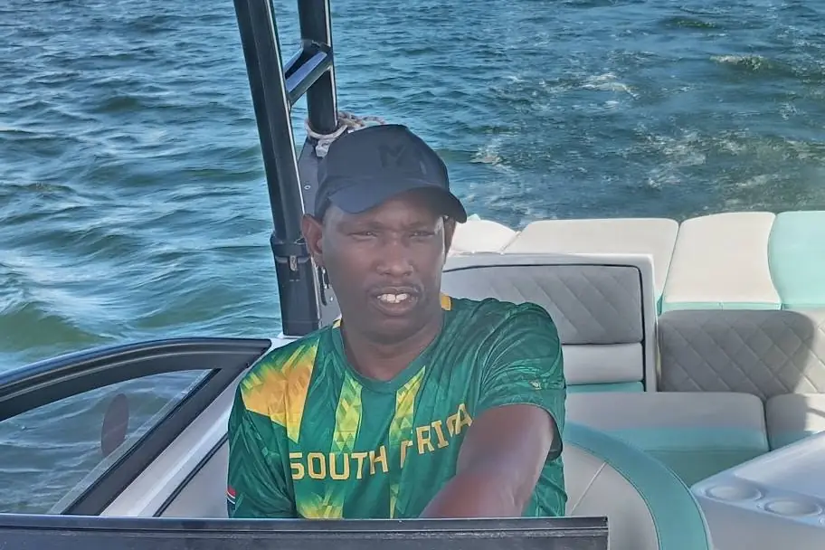 Jonas at the helm on the Knysna lagoon