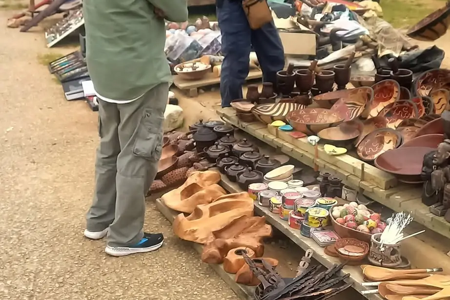 Guests browsing a roadside craft market