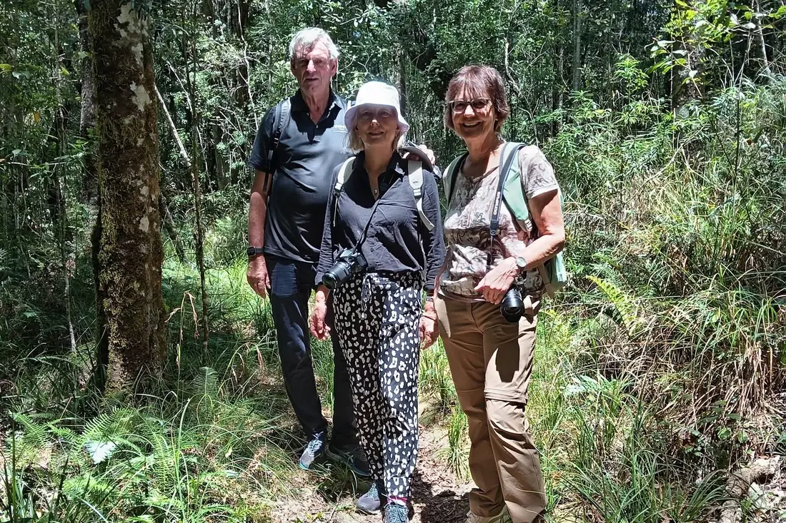 Three guests on a forest path in the indigenous Knysna forest