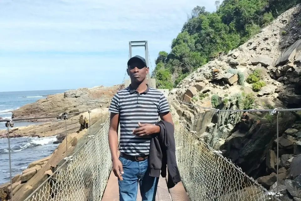 Jonas on the boardwalk to the Storms River suspension bridge